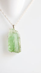 Raw Green Tourmaline Crystal Pendant โ 925 Sterling Silver